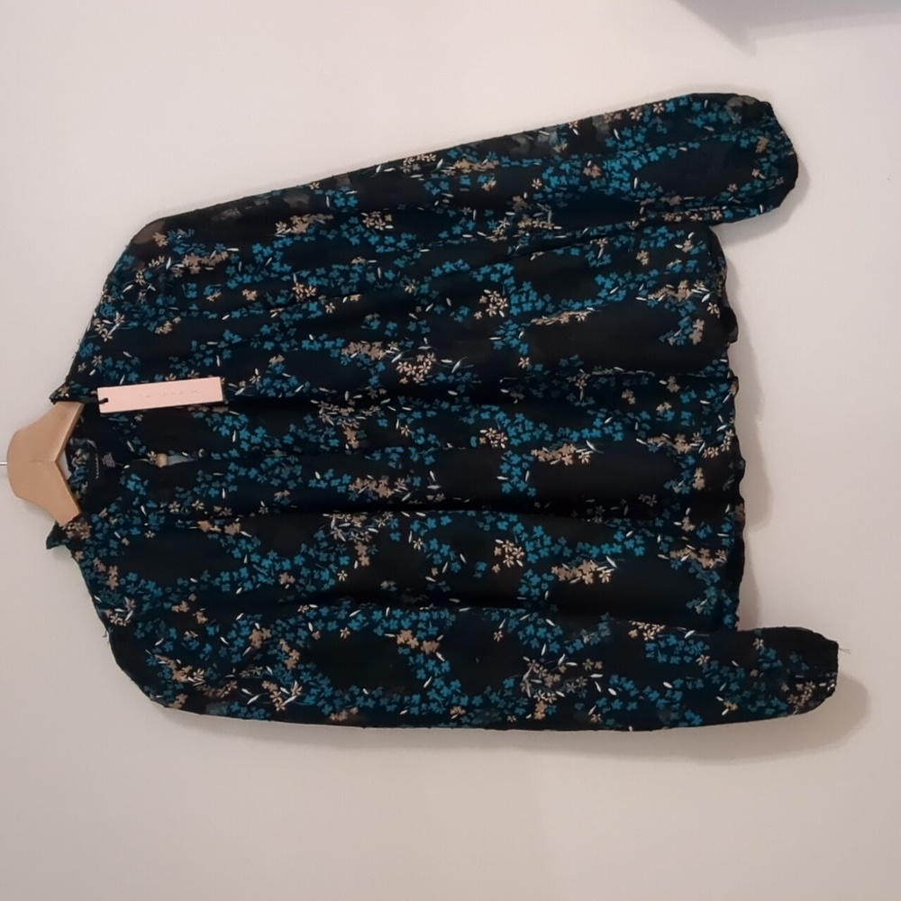 Tamara H. Long sleeve floral blouse size small.